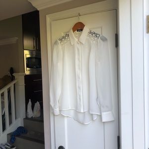 Worn once. Like new beautiful sheer blouse